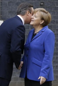 David Cameron greets Angela Merkel